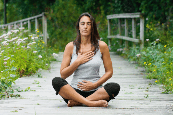 Women Performing Meditation In Nature
